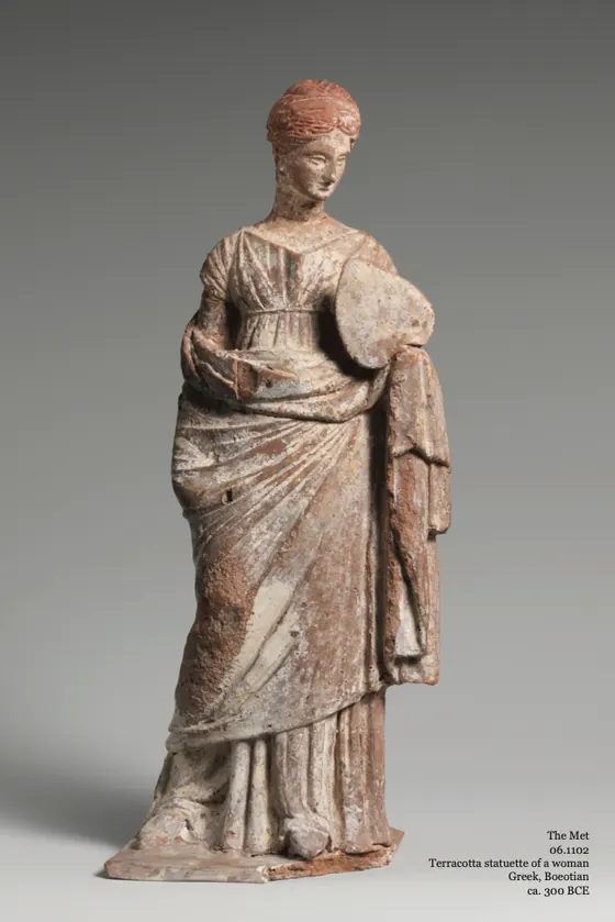 A Greek terracotta statuette of a woman holding a fan, about 300 BCE.