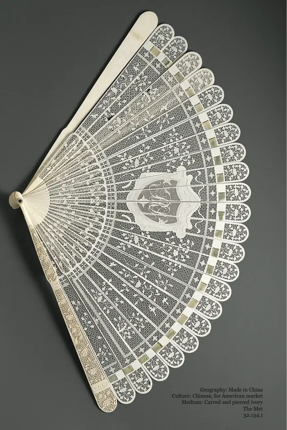 A carved and pierced ivory folding fan, made in China for the American market.